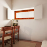 Eduardo Souto de Moura’s Convento das Bernardas Residence interior showcasing wooden flooring, brown furniture, and minimalist ceiling design in a spacious room.