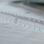 Gonçalo Cardoso de Menezes’ 21 Architectural Townhouses, Lot 154, showcasing a modern design with silver-toned plastic elements and a sleek, minimalist façade.