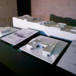 Eduardo Souto de Moura’s 13 Architectural "C-Shaped" Villas, Lot 101, scale model showcasing composite materials with a detailed plastic plan highlighting the innovative C-shaped design and spatial arrangement.