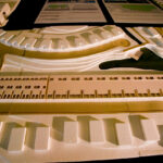 Nuno Graça Moura’s 30 Architectural "Bar Code 1" Townhouses, Lot 152, showcasing a detailed scale model with a linear arrangement of modern townhouses featuring repetitive vertical elements resembling a barcode pattern.