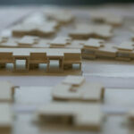 Atelier dos Remédios, Madalena Cardoso de Menezes, and Francisco Teixeira Bastos' scale model of the 18 Red Architectural Townhouses, Lot 215, showcasing detailed plastic building sets with modern townhouse design elements.