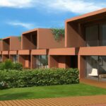 Atelier dos Remédios, Madalena Cardoso de Menezes and Francisco Teixeira Bastos’ 18 Red Architectural Townhouses, Lot 215, showcasing a modern urban estate with landscaped yards and villa-style townhouses.