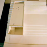 Nuno Graça Moura’s 2 Architectural Villas, Lot 75, showcasing a modern design with visible plywood structural elements and detailed architectural plans.