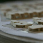 Atelier dos Remédios, Madalena Cardoso de Menezes and Francisco Teixeira Bastos' 10 Architectural "Casa O" Villas, Lot 127 scale model showcasing a modern design with clean lines and geometric forms in plastic.