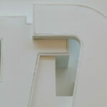 Atelier dos Remédios, Madalena Cardoso de Menezes and Francisco Teixeira Bastos’ 10 Architectural "Casa O" Villas, Lot 127, showcasing white and silver minimalist villas with clean lines and modern geometric forms.