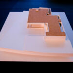 Atelier dos Remédios, Madalena Cardoso de Menezes and Francisco Teixeira Bastos’ scale model of the 6 Architectural "Casa L" Villas, Lot 131, showcasing detailed plywood plans and design elements.