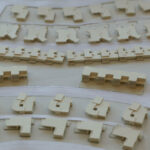 Atelier dos Remédios, Madalena Cardoso de Menezes and Francisco Teixeira Bastos’ scale model of the 10 Architectural "Casa O" Villas, Lot 127, showcasing detailed plastic and plywood assemblies.