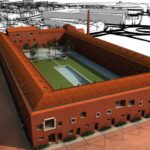 Eduardo Souto de Moura’s Convento das Bernardas Residence showcasing a bird’s-eye view of the historic courtyard and surrounding campus buildings with traditional stone façades and open town square spaces.